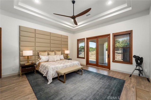 54774 Bautista Rd, Anza, CA 92539 - bedroom featuring a raised ceiling, access to outside, wood finished floors, recessed lighting, and ceiling fan