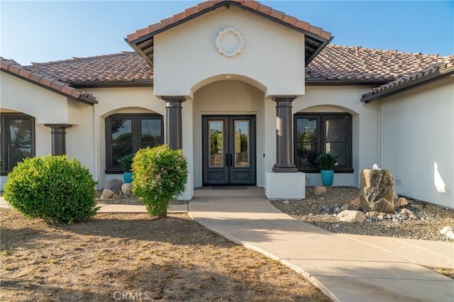 54774 Bautista Rd, Anza, CA 92539 - doorway to property featuring french doors, a tiled roof, and stucco siding