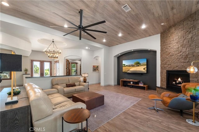 54774 Bautista Rd, Anza, CA 92539 - living area with a fireplace, a ceiling fan, wood finished floors, wooden ceiling, and recessed lighting