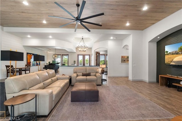 54774 Bautista Rd, Anza, CA 92539 - living room featuring wood finished floors, wood ceiling, ceiling fan, recessed lighting, and arched walkways