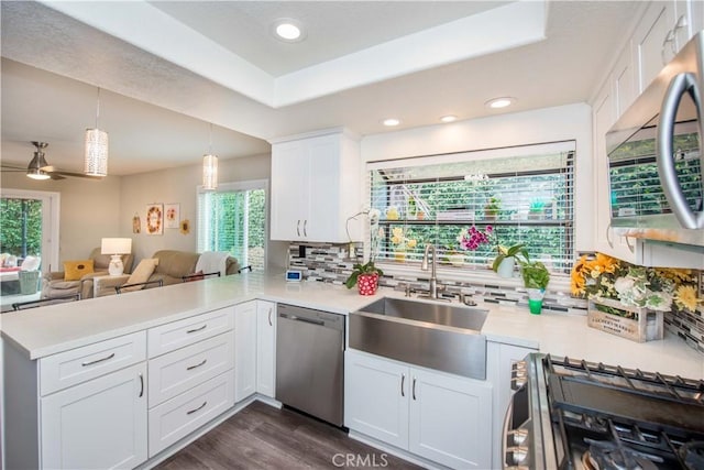 747 De Jesus, Placentia, CA 92870 - kitchen with stainless steel appliances, a peninsula, light countertops, plenty of natural light, and recessed lighting