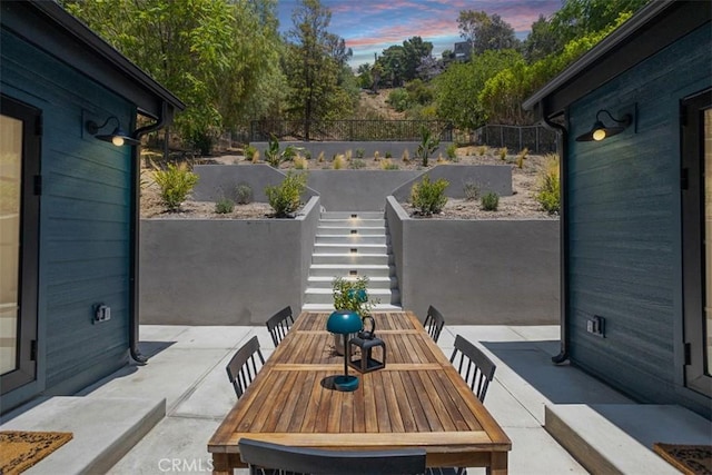 3756 Goodland Ave, Studio City, CA 91604 - fenced backyard featuring outdoor dining space, a vegetable garden, and a patio area