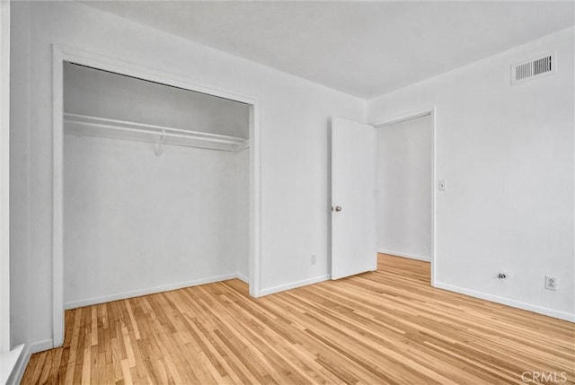 10422 Gilbert St, Anaheim, CA 92804 - unfurnished bedroom featuring light wood finished floors and a closet