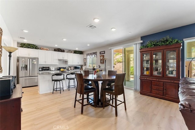 4073 Tamarind Rdg, Lake Elsinore, CA 92530 - dining room featuring light wood finished floors and recessed lighting