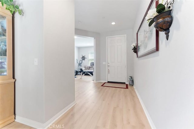 4073 Tamarind Rdg, Lake Elsinore, CA 92530 - corridor featuring light wood finished floors and recessed lighting