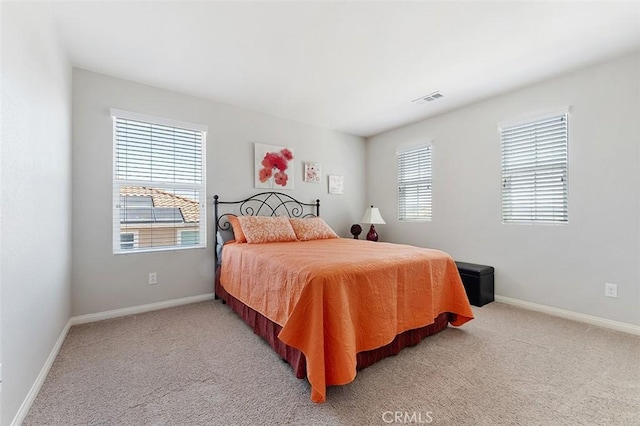 4073 Tamarind Rdg, Lake Elsinore, CA 92530 - bedroom with light colored carpet and baseboards