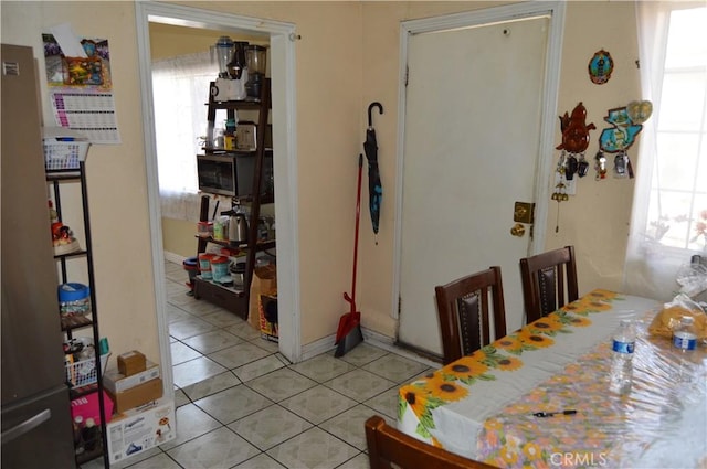 13104 Hoyt St, Pacoima, CA 91331 - dining space with light tile patterned flooring