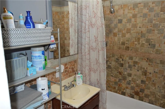 13104 Hoyt St, Pacoima, CA 91331 - bathroom with vanity and shower / tub combo with curtain
