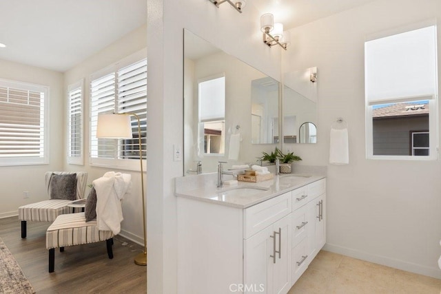 542 Cultivate, Irvine, CA 92618 - bathroom with double vanity and wood finished floors