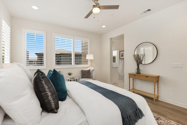 542 Cultivate, Irvine, CA 92618 - bedroom featuring wood finished floors, multiple windows, recessed lighting, connected bathroom, and a ceiling fan