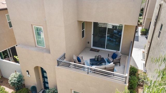 542 Cultivate, Irvine, CA 92618 - rear view of property with stucco siding, an outdoor living space, and a patio area