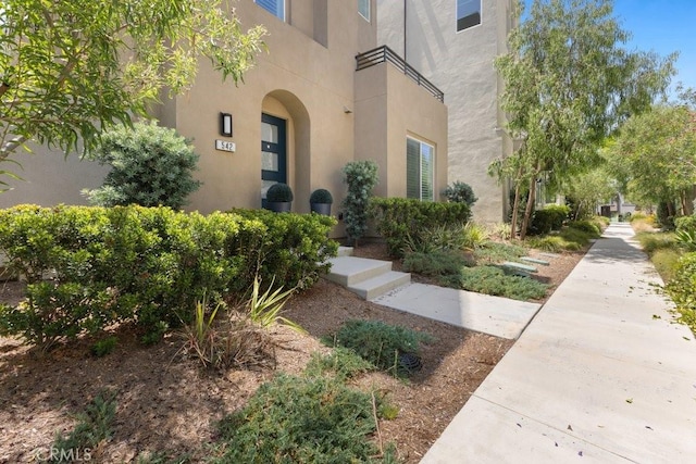 542 Cultivate, Irvine, CA 92618 - doorway to property with stucco siding
