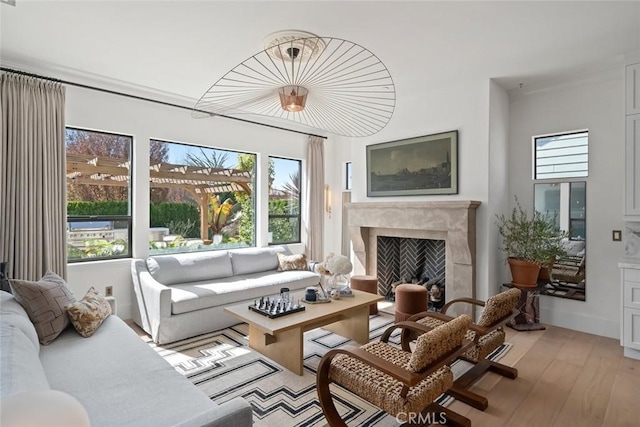 1115 Myles Ln, Nipomo, CA 93444 - living area with light wood finished floors, plenty of natural light, and a fireplace