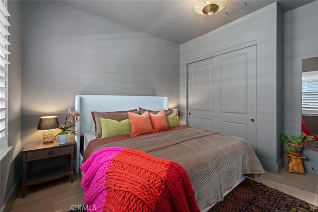 1115 Myles Ln, Nipomo, CA 93444 - bedroom with wood finished floors, a closet, and lofted ceiling