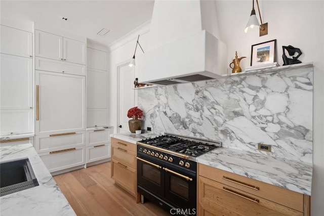 1115 Myles Ln, Nipomo, CA 93444 - kitchen with double oven range, exhaust hood, tasteful backsplash, light wood-type flooring, and light stone countertops