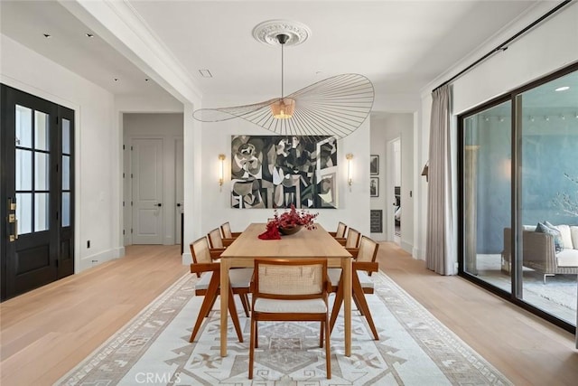 1115 Myles Ln, Nipomo, CA 93444 - dining area with light wood finished floors and ornamental molding
