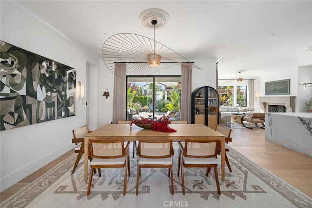 1115 Myles Ln, Nipomo, CA 93444 - dining space with wood finished floors and a fireplace