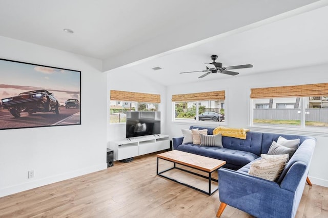 1009 S Cleveland St, Oceanside, CA 92054 - living room featuring vaulted ceiling, light wood-style flooring, and a ceiling fan
