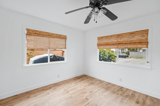 1009 S Cleveland St, Oceanside, CA 92054 - empty room with wood finished floors and a ceiling fan