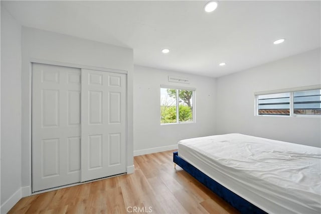149 N Vail Ave, Montebello, CA 90640 - bedroom with recessed lighting, light wood finished floors, and a closet