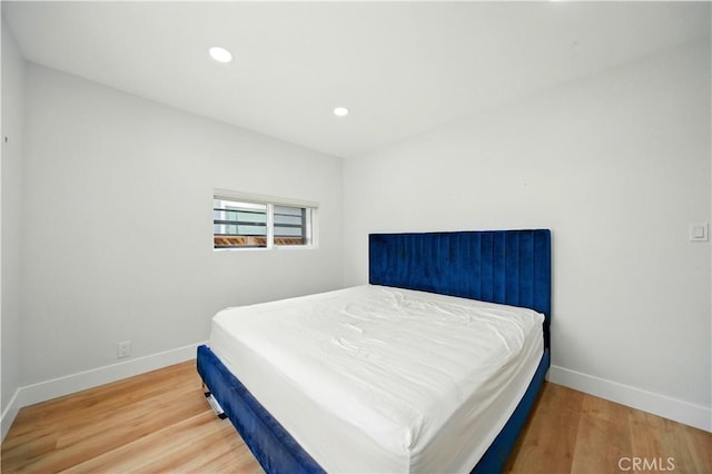 149 N Vail Ave, Montebello, CA 90640 - bedroom with recessed lighting and wood finished floors