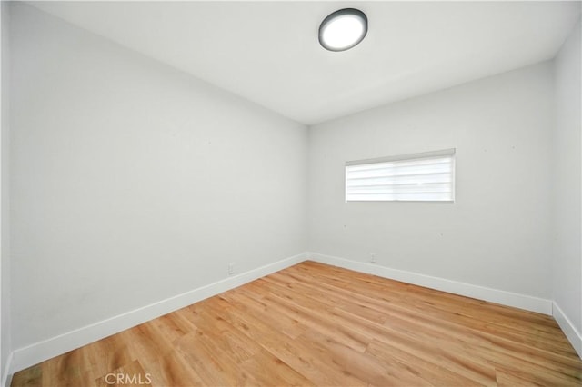 149 N Vail Ave, Montebello, CA 90640 - spare room featuring baseboards and light wood-style floors