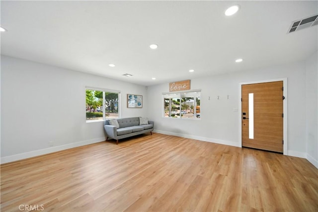 149 N Vail Ave, Montebello, CA 90640 - sitting room with light wood finished floors and recessed lighting