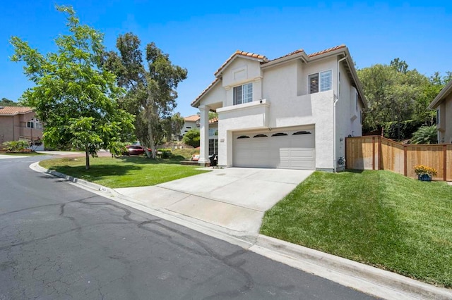 3430 Corte Viejo, Carlsbad, CA 92009 - mediterranean / spanish house featuring an attached garage, concrete driveway, stucco siding, and a tile roof