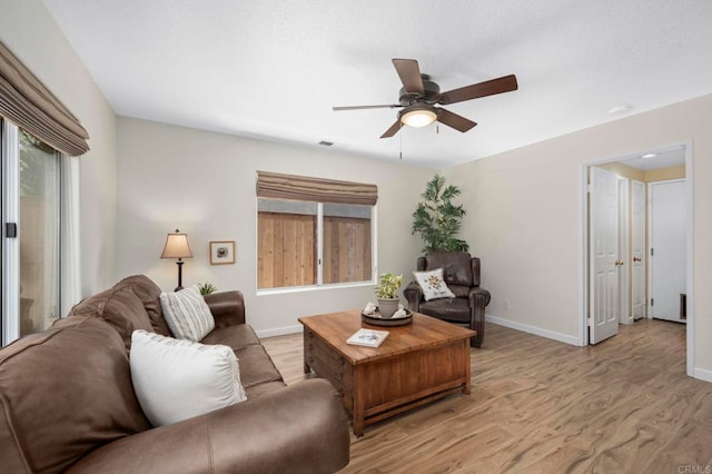 3430 Corte Viejo, Carlsbad, CA 92009 - living area with a ceiling fan and wood finished floors