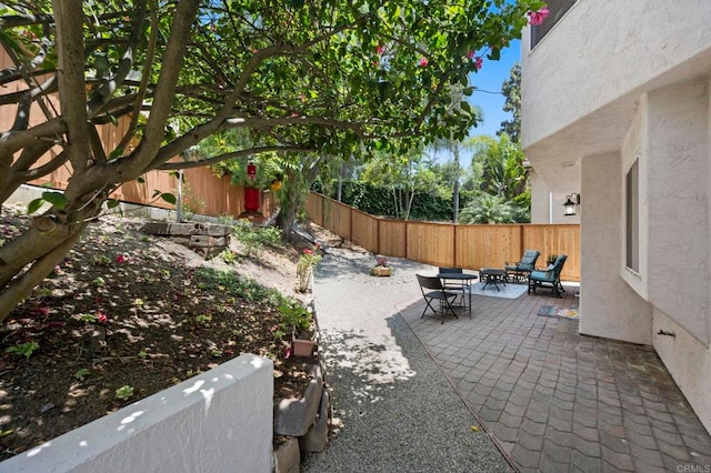 3430 Corte Viejo, Carlsbad, CA 92009 - fenced backyard featuring a patio area and an outdoor living space