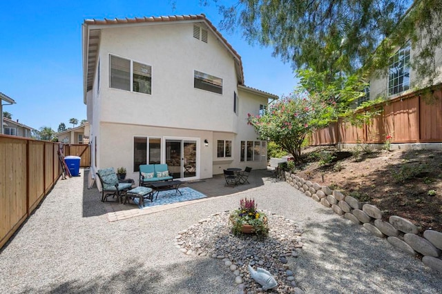 3430 Corte Viejo, Carlsbad, CA 92009 - rear view of property with stucco siding, an outdoor hangout area, a fenced backyard, and a patio