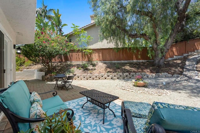 3430 Corte Viejo, Carlsbad, CA 92009 - fenced backyard featuring a patio area, outdoor dining space, and outdoor lounge area