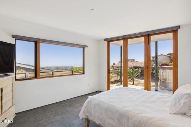 572 Skyline Rd, Ventura, CA 93003 - bedroom with access to outside and wood finished floors