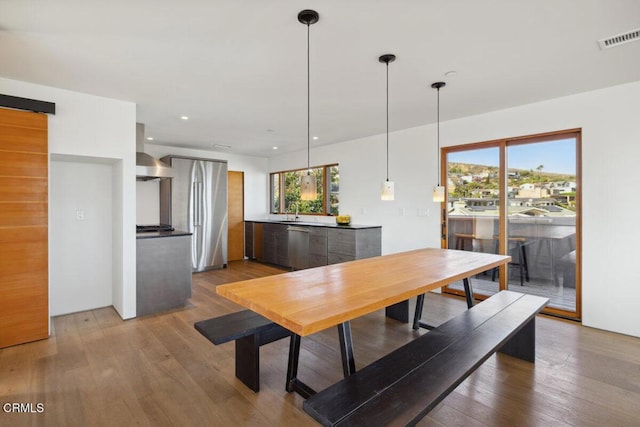 572 Skyline Rd, Ventura, CA 93003 - dining area with wood finished floors and recessed lighting