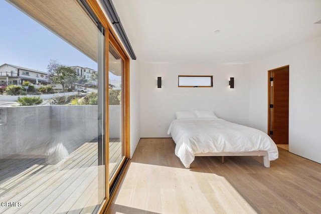 572 Skyline Rd, Ventura, CA 93003 - bedroom featuring wood finished floors and access to exterior