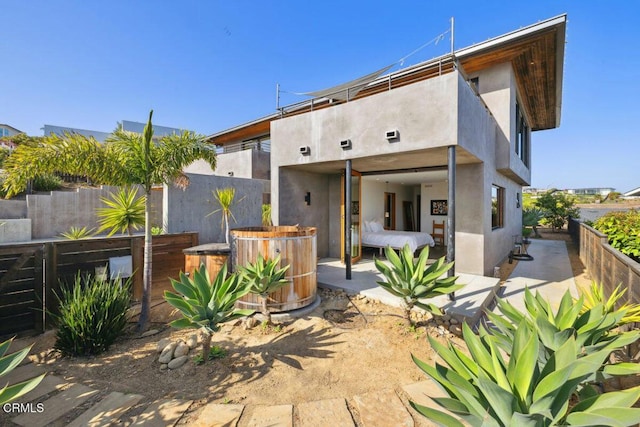 572 Skyline Rd, Ventura, CA 93003 - rear view of property with a patio and stucco siding