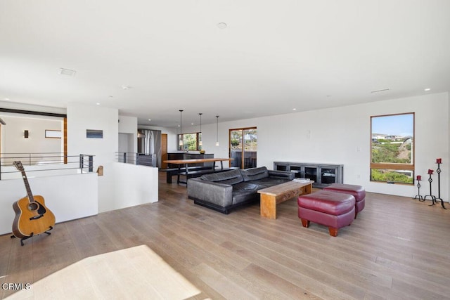 572 Skyline Rd, Ventura, CA 93003 - living area with plenty of natural light, light wood-style floors, and recessed lighting
