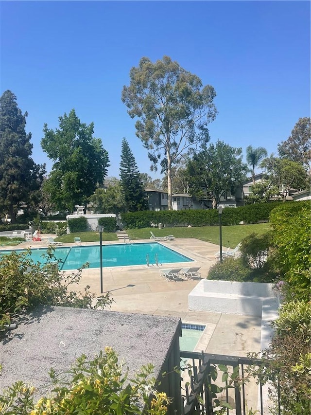 20359 Ivy Hill Ln Unit 13, Yorba Linda, CA 92886 - community pool featuring a patio area and a lawn