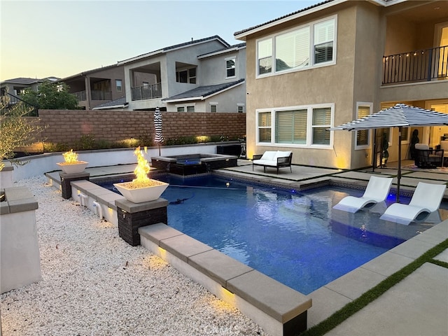 2516 Chad Zeller Ln, Corona, CA 92882 - view of pool featuring a fire pit, a fenced backyard, a patio area, and a pool with connected hot tub
