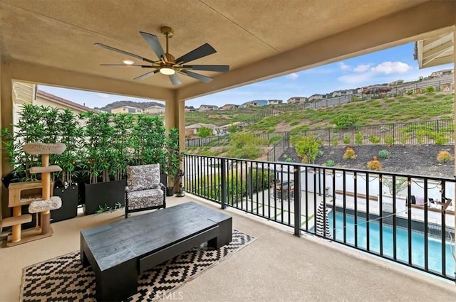 2516 Chad Zeller Ln, Corona, CA 92882 - balcony featuring a ceiling fan and view of pool area