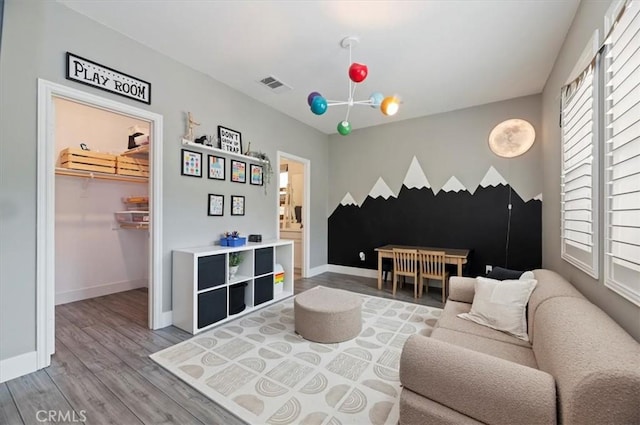 2516 Chad Zeller Ln, Corona, CA 92882 - living area with a chandelier and wood finished floors