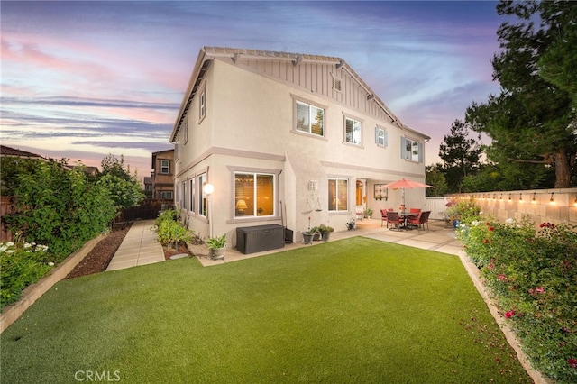 1782 Saige View Cir, Upland, CA 91784 - rear view of property with a patio, a fenced backyard, stucco siding, and board and batten siding