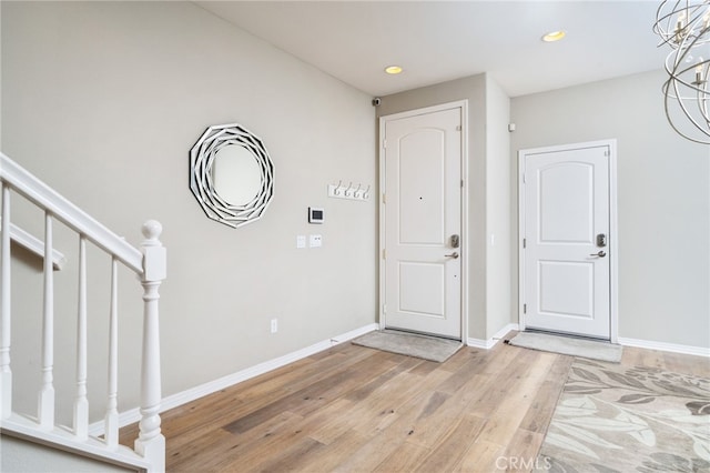 1782 Saige View Cir, Upland, CA 91784 - foyer entrance with light wood-style flooring, stairs, a chandelier, and recessed lighting