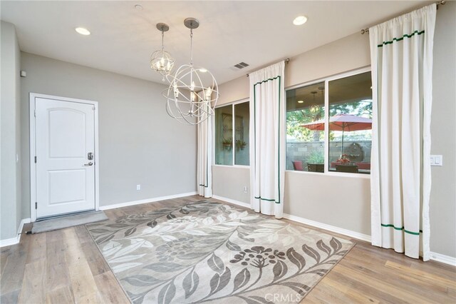 1782 Saige View Cir, Upland, CA 91784 - unfurnished dining area featuring a chandelier, wood finished floors, and recessed lighting