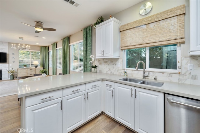 1782 Saige View Cir, Upland, CA 91784 - kitchen featuring stainless steel dishwasher, decorative backsplash, a peninsula, and light countertops