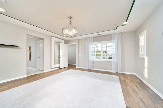 1782 Saige View Cir, Upland, CA 91784 - unfurnished room with wood finished floors and a chandelier