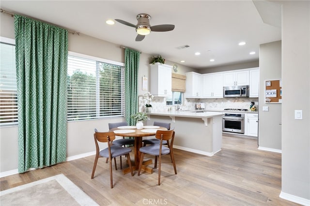 1782 Saige View Cir, Upland, CA 91784 - dining space featuring light wood-type flooring, a ceiling fan, and recessed lighting