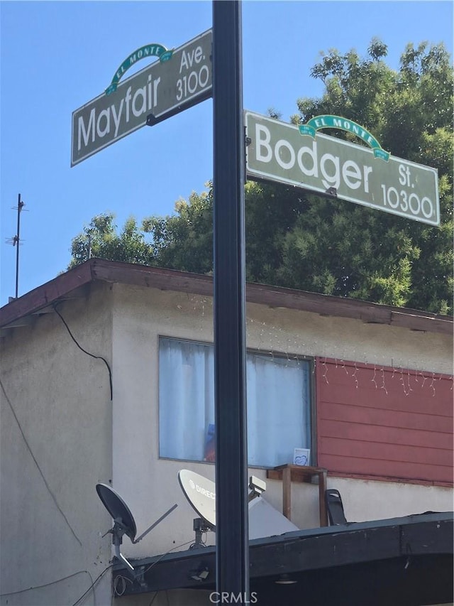 10327 Bodger St, El Monte, CA 91733 - detailed view of stucco siding and a desk