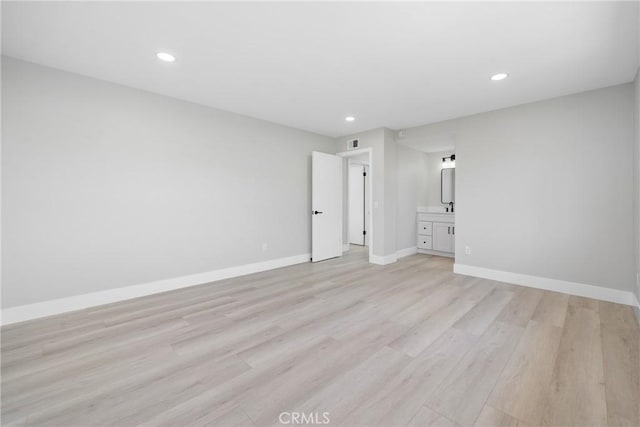 18684 Santa Ynez St, Fountain Valley, CA 92708 - unfurnished bedroom featuring light wood finished floors, recessed lighting, and ensuite bath