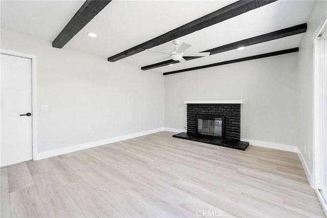 18684 Santa Ynez St, Fountain Valley, CA 92708 - unfurnished living room featuring beamed ceiling, ceiling fan, a brick fireplace, light wood-type flooring, and recessed lighting